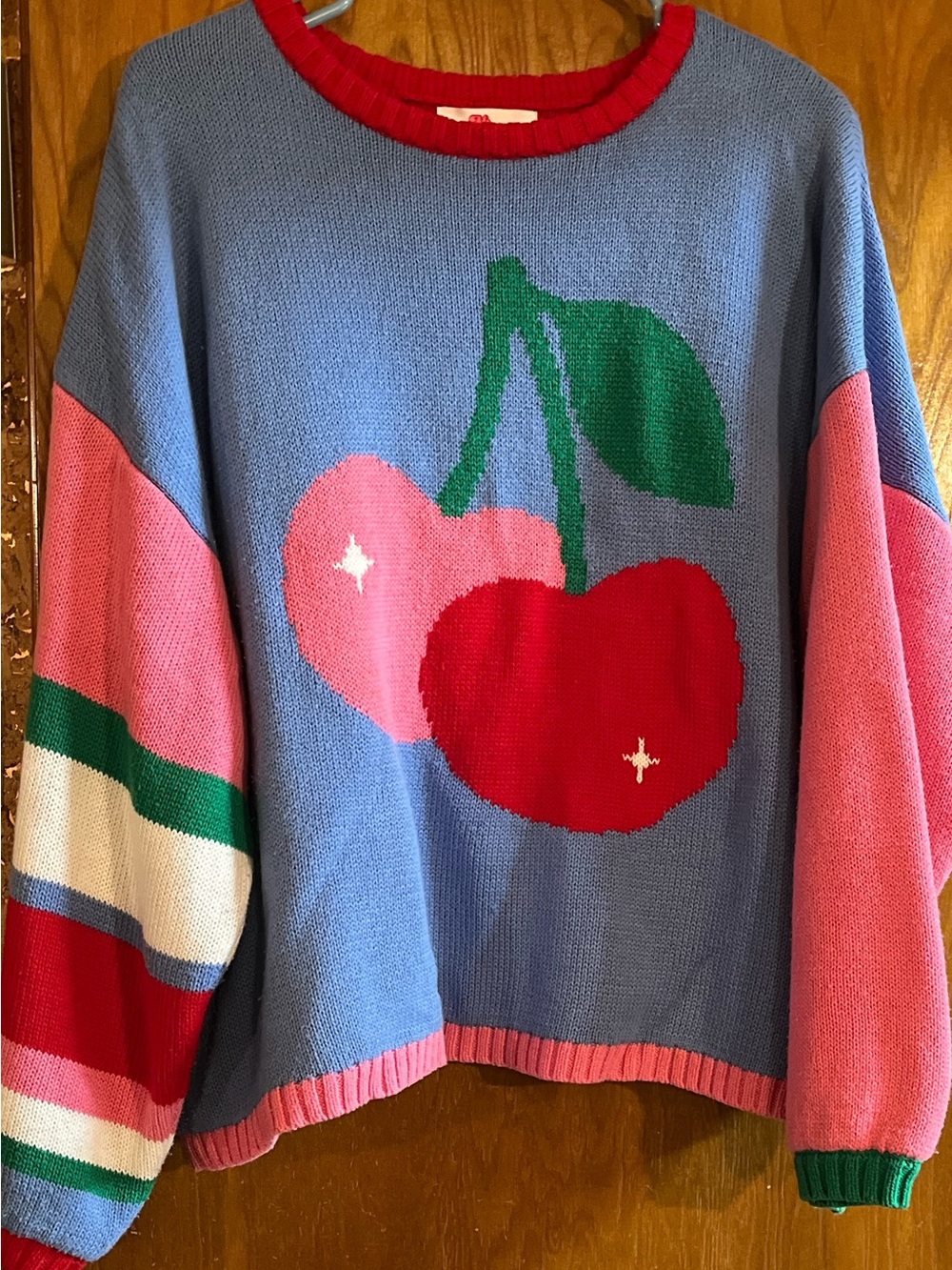 Blue Cherry Graphic Crewneck Sweater with Pink & Red Accents